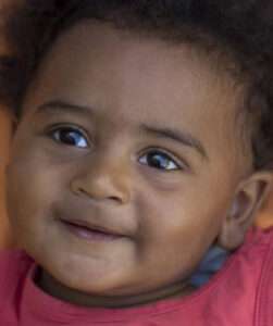 Baby smiling for camera